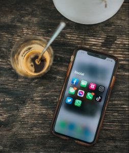 white samsung android smartphone on brown wooden table